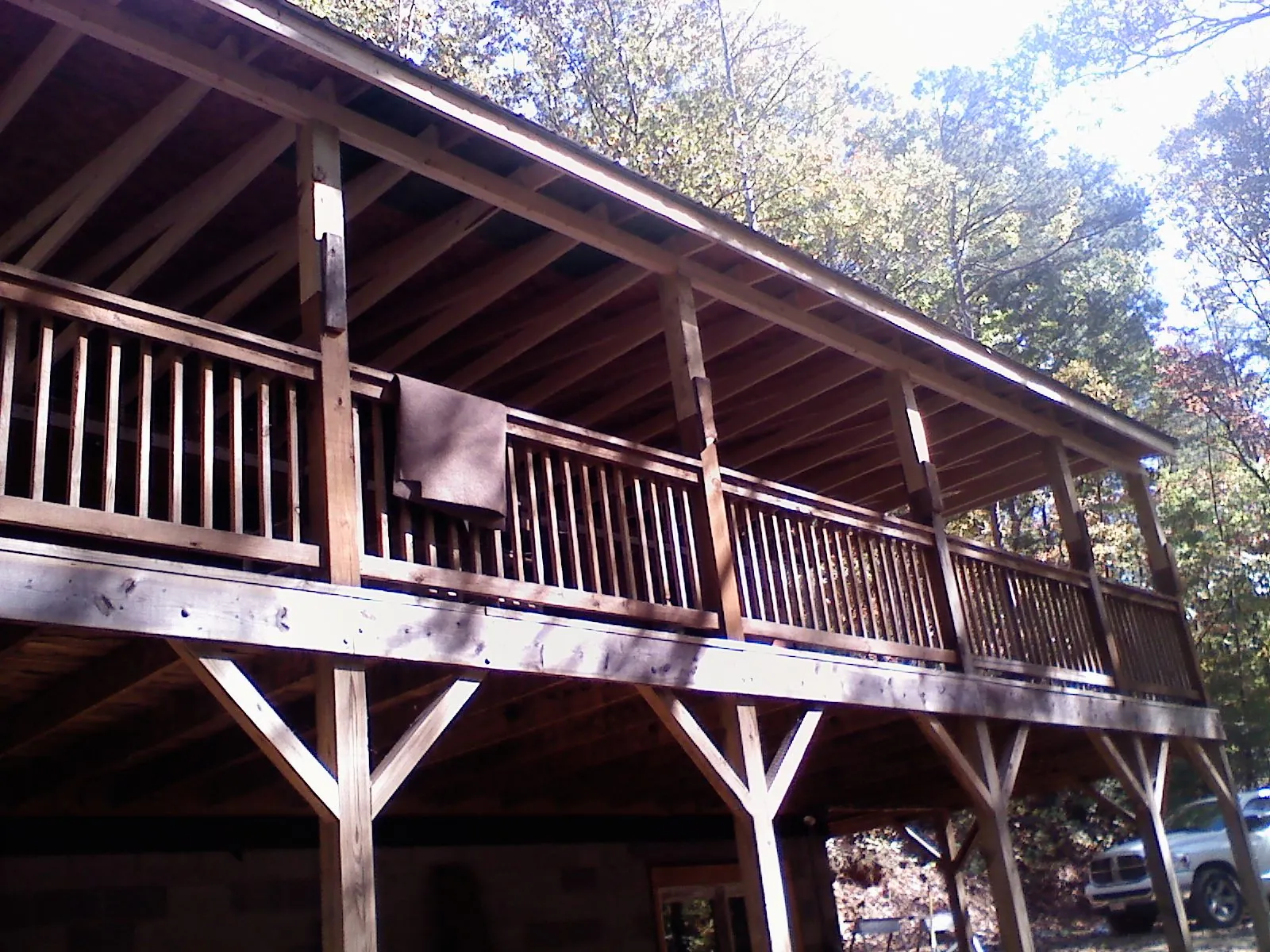Timber framing under a new elevated porch and deck — Roof Leak Repair in Scribner by Roofing Brothers